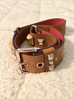 PRADA - Studded brown leather belt by the luxury brand Prada.